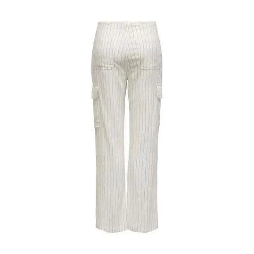 White pinstripe trousers for women highlighting urban city style fashion