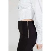 Sandro Ferrone crop top modelled with Sandro Ferrone women trousers