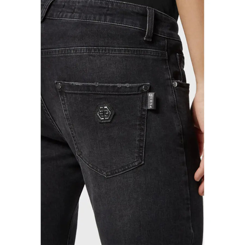 Back side of Philipp Plein black stretch cotton jeans for women featuring a hexagonal logo patch on the pocket