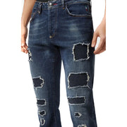 Jean Philipp Plein pour homme, bleu marine déchiré et usé, avec bords effilochés et empiècements en coton noir.