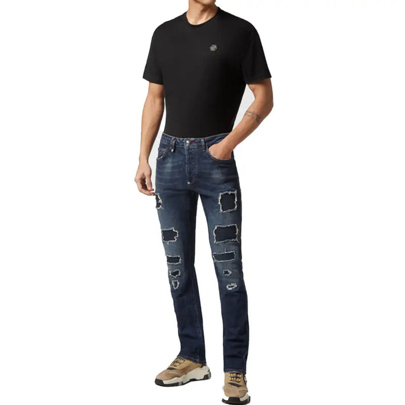 Jean Philipp Plein pour homme, bleu, en coton déchiré, effet usé, avec empiècements bleu foncé délavés et logo brodé.