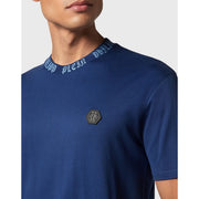 Navy blue short-sleeved Philipp Plein men t-shirt with white embroidered logo collar and black hexagonal chest emblem