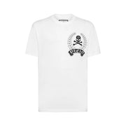 T-shirt Philipp Plein pour homme, en coton blanc, col rond, orné d'un emblème brodé noir représentant une tête de mort et des os croisés dans une couronne de laurier.