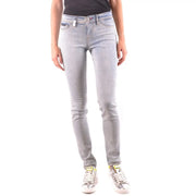 Jean Philipp Plein pour femme, en denim bleu coton, coupe slim, délavage clair et détails subtilement délavés.