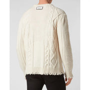 Pull Philipp Plein en laine couleur crème pour femme, à maille torsadée, ourlet et poignets effilochés (vue de face)