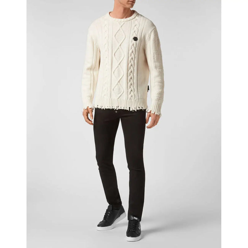 Pull Philipp Plein en laine couleur crème pour femme, à motif losanges en maille torsadée, ourlet et poignets effilochés, vue de face