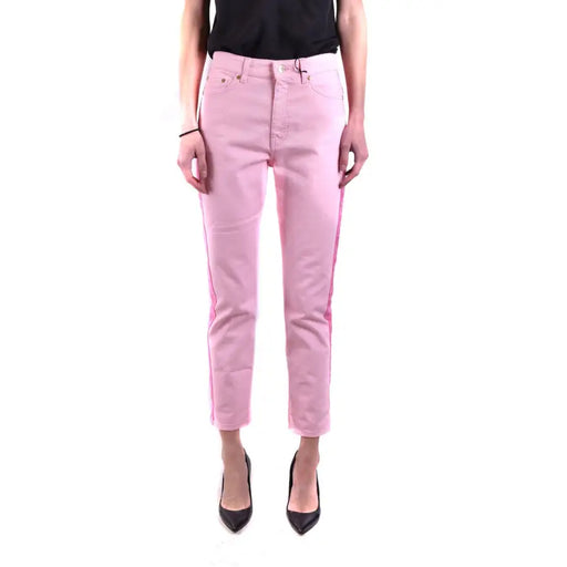 Women’s light pink cropped trousers with dark pink side stripes and black high heels