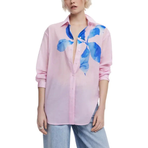Pink floral-print button-down shirt displayed in a product listing for stylish apparel