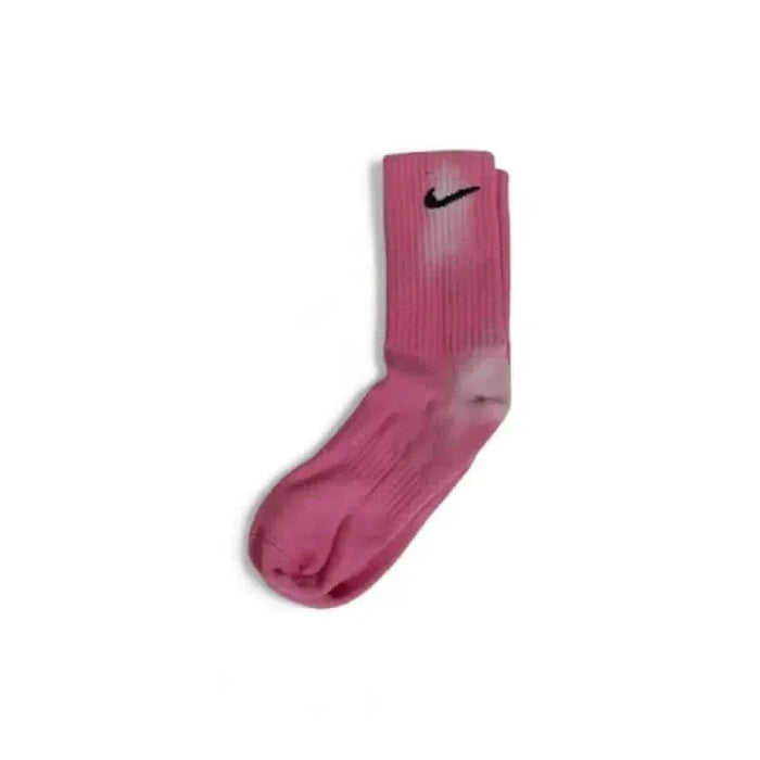 Pink Nike athletic sock with black swoosh logo from the Nike Men Underwear collection