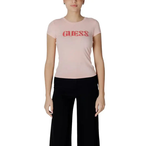 Pink T shirt with GUESS logo displayed on a product named Pink T Shirt with GUESS Logo