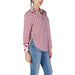 Pink and white patterned blouse with blue jeans for Guess Women’s shirt outfit