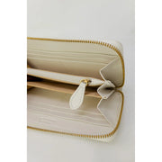 Pinko Portefeuille femme en cuir beige zippé, avec fermeture éclair en cuir crème et languette assortie.