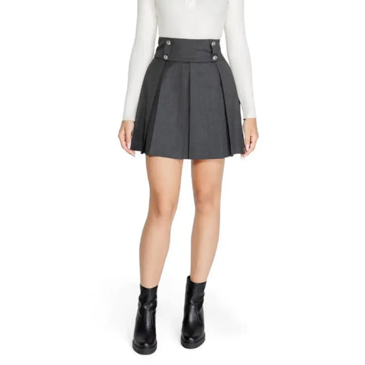Pleated gray high waist mini skirt displayed for fashion product photography