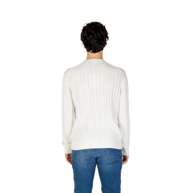 A cream-colored ribbed knit sweater with classic crew neck in soft cotton cashmere blend by US Polo Assn menswear