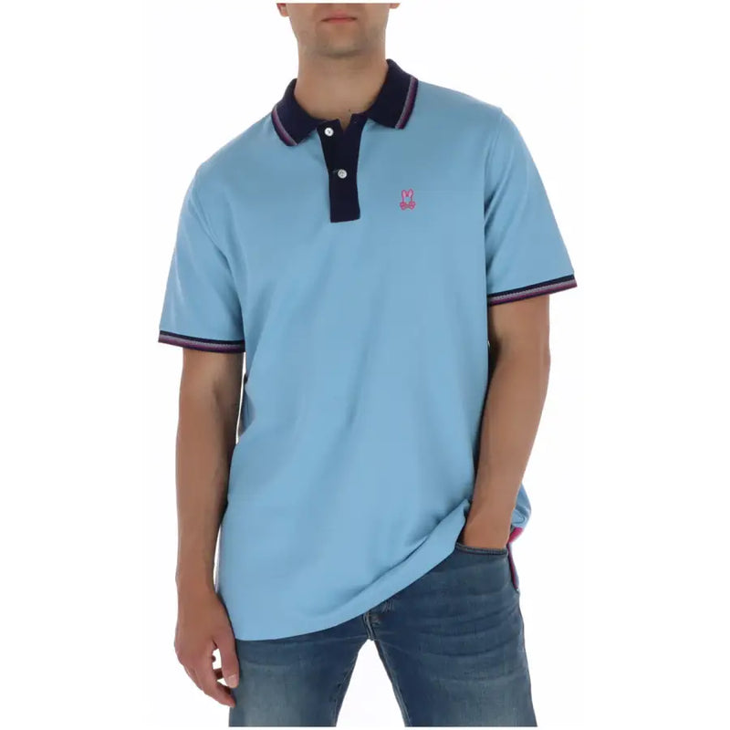 Polo homme Psycho Bunny bleu clair à manches courtes en coton, col et poignets bleu marine et logo brodé rose