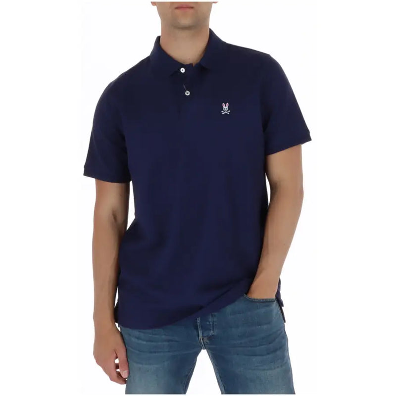Polo homme bleu marine à manches courtes en coton, orné d'un logo lapin et crâne brodé en blanc sur la poitrine gauche.