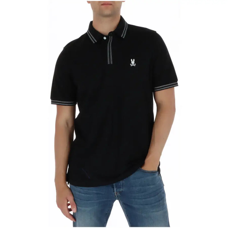 Polo Psycho Bunny pour homme, manches courtes, en coton noir, col blanc et logo lapin brodé sur la poitrine.