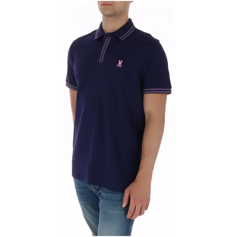 Polo homme Psycho Bunny en coton bleu marine à manches courtes, orné d'un logo lapin brodé rose et de fines rayures blanches.