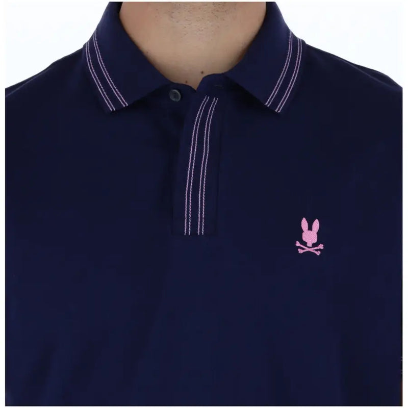 Polo homme Psycho Bunny bleu marine à manches courtes en coton avec double couture blanche et logo brodé rose