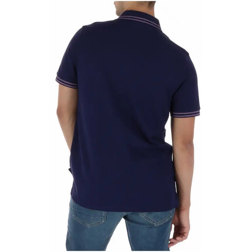 Polo homme Psycho Bunny bleu marine à manches courtes avec bordures blanches et violettes, en coton, modèle MT0100122