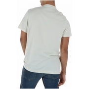 T-shirt homme Psycho Bunny blanc en coton, col rond, uni, blanc cassé, manches courtes.