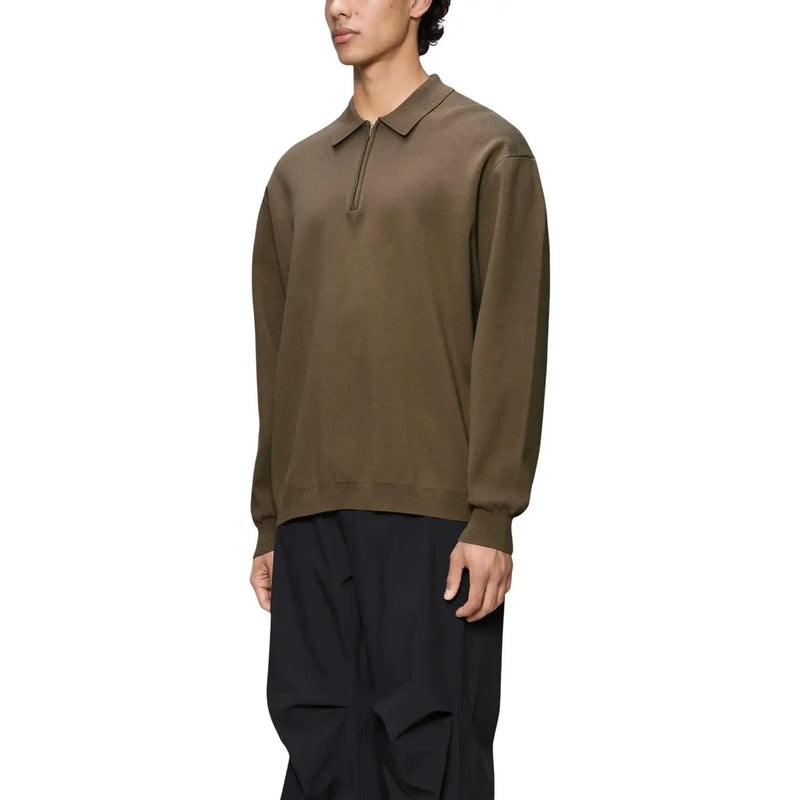 Polo Rains pour homme, coupe ajustée, vert olive, demi-zip et poignets côtelés, vue de face