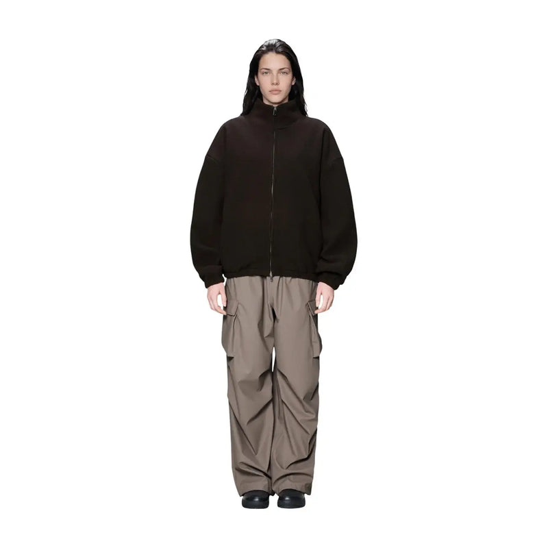 Black womens fleece zip jacket by Rains with high neck and relaxed fit in brown polyester material