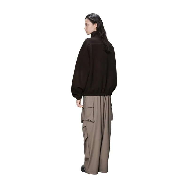 Black oversized bomber jacket with elastic cuffs and high collar shown from the back in rains women fleece zip jacket brown polyester