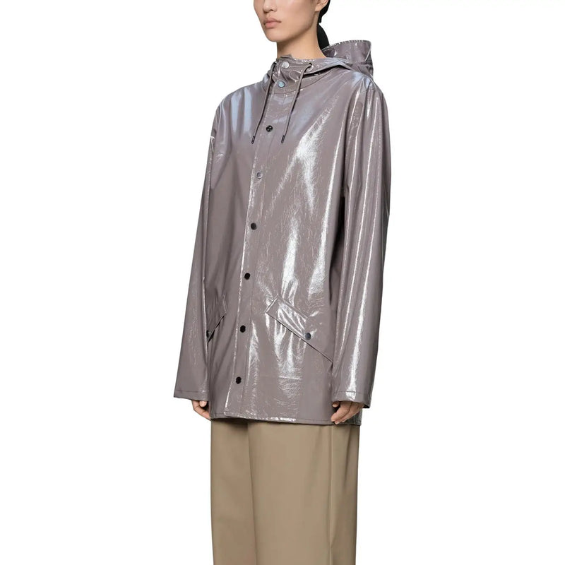 A sleek metallic gray raincoat with glossy finish and black buttons featured in rains women purple polyester hooded blazer jacket