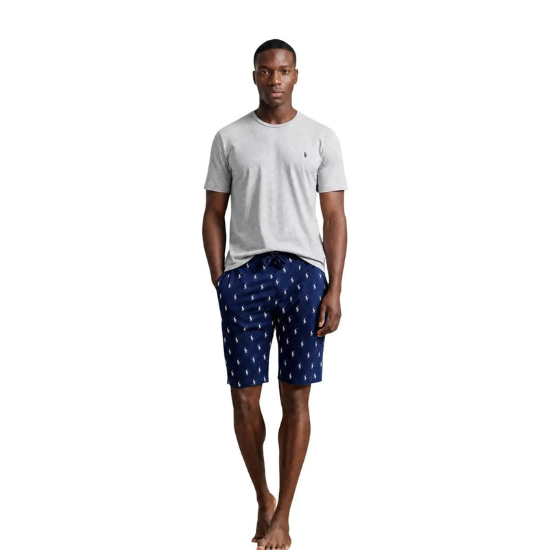 Navy blue shorts with white polo player logos and drawstring waistband paired with ralph lauren mens grey cotton crew sleep top