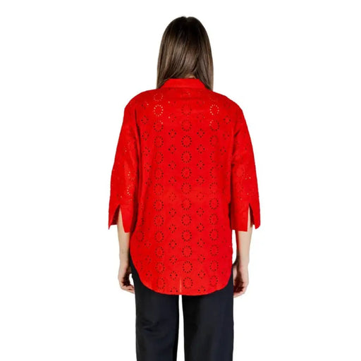Red eyelet blouse displayed as Red Eyelet Button Down Shirt highlighting stylish design