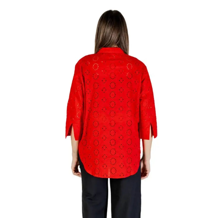 Red eyelet blouse displayed as Red Eyelet Button Down Shirt highlighting stylish design