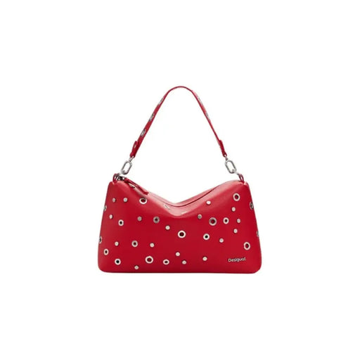 Red leather shoulder bag with silver grommets for stylish accessories