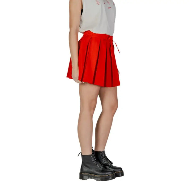 Red lace polyester skirt for women featuring a vibrant red pleated mini design with matching drawstring waistband