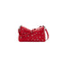 Red leather shoulder bag with silver grommets, stylish accessory for any occasion