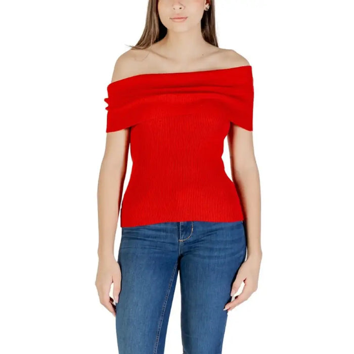 Red off-the-shoulder ribbed top paired with Khaki Pants for women