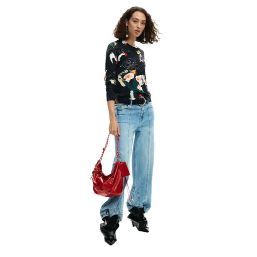 Vibrant red patent leather hobo bag with chain strap by Desigual suitable for shoulder use