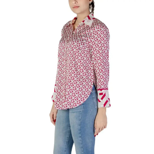 Red and white patterned button-up shirt with geometric print and contrast cuffs