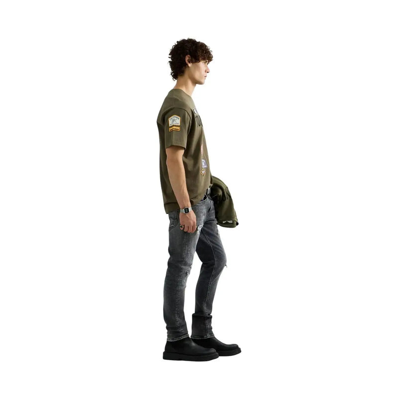 T-shirt Replay pour homme, vert coton, coupe décontractée, avec détails patchwork sur les manches courtes et le devant.
