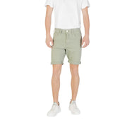 Olive green cotton shorts with rolled hem and button fly design.