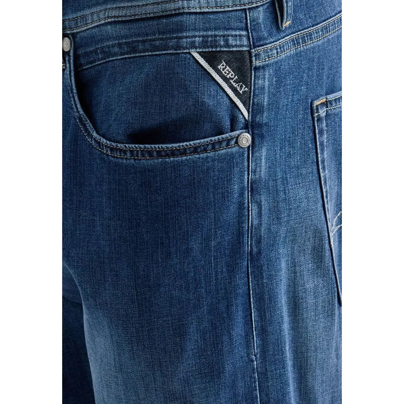 Back side of replay men straight leg jeans in dark blue stretch cotton denim with subtle faded wash and branded back pocket patch