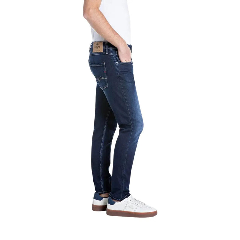 Jean Replay Power Stretch pour homme en denim bleu foncé, coupe slim et délavage subtil aux cuisses (vue de face)