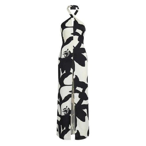 Robe d'été blanche à bretelles et col en V, style maxi dos nu, ornée d'un imprimé botanique noir et blanc.