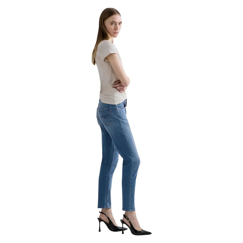 Jean slim en coton bleu pour femme Replay, coupe classique et délavage subtil aux cuisses.