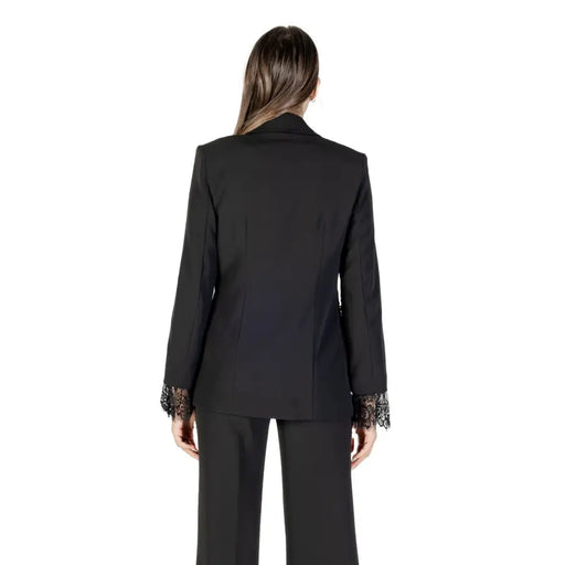 Women’s black pantsuit with lace cuffs featuring Rinascimento Black Buttoned Long V Neck Blazer