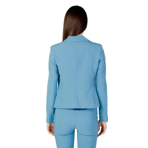 A tailored light blue Rinascimento blazer with structured fit, notched lapels, button, and lapel collar detail