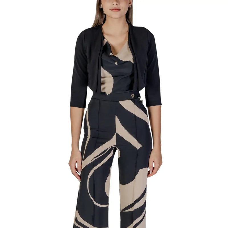 Black and beige abstract-patterned wide-leg trousers with a sleek modern design for women by Rinascimento