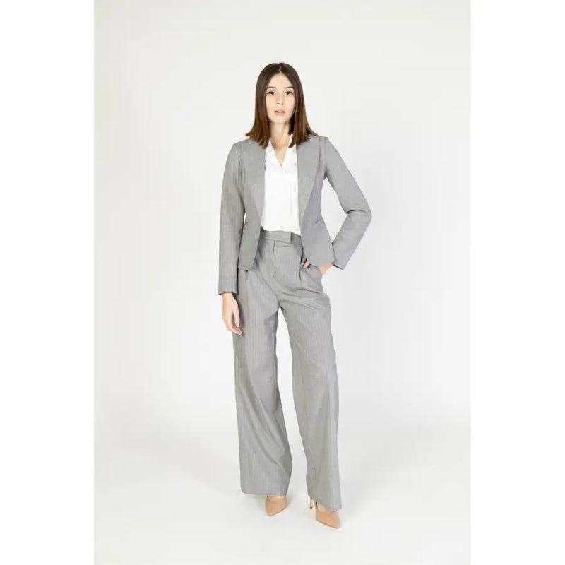 Gray pinstripe suit featuring a tailored blazer and wide-leg trousers from rinascimento womens pink pinstripe collection