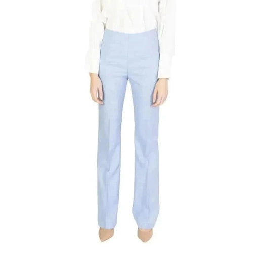 Sandro Ferrone women trousers in stylish row person display