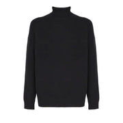 Black turtleneck sweater with ribbed neckline and cuffs, likely made of wool or a similar material.